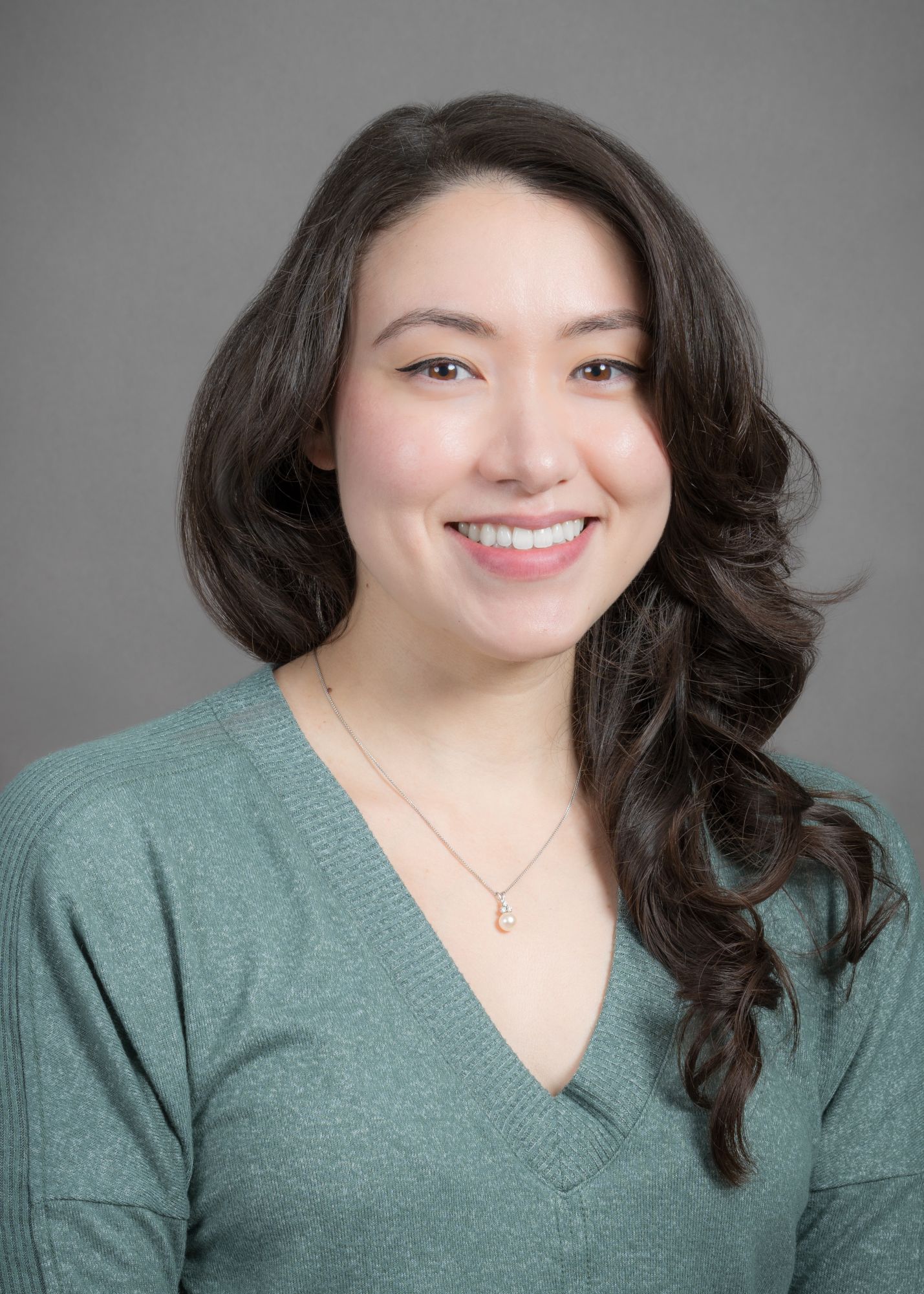Dr. Jackie Birnbaum smiling while looking forward. 