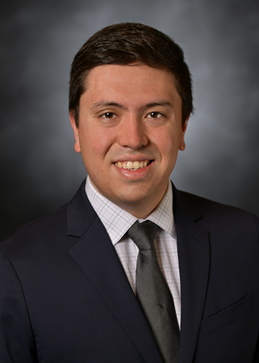 Dr. Olivas smiling