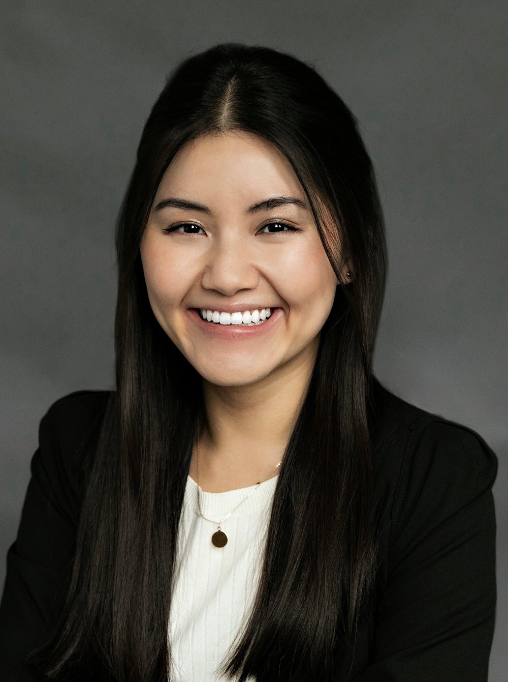 Dr. Tran smiling