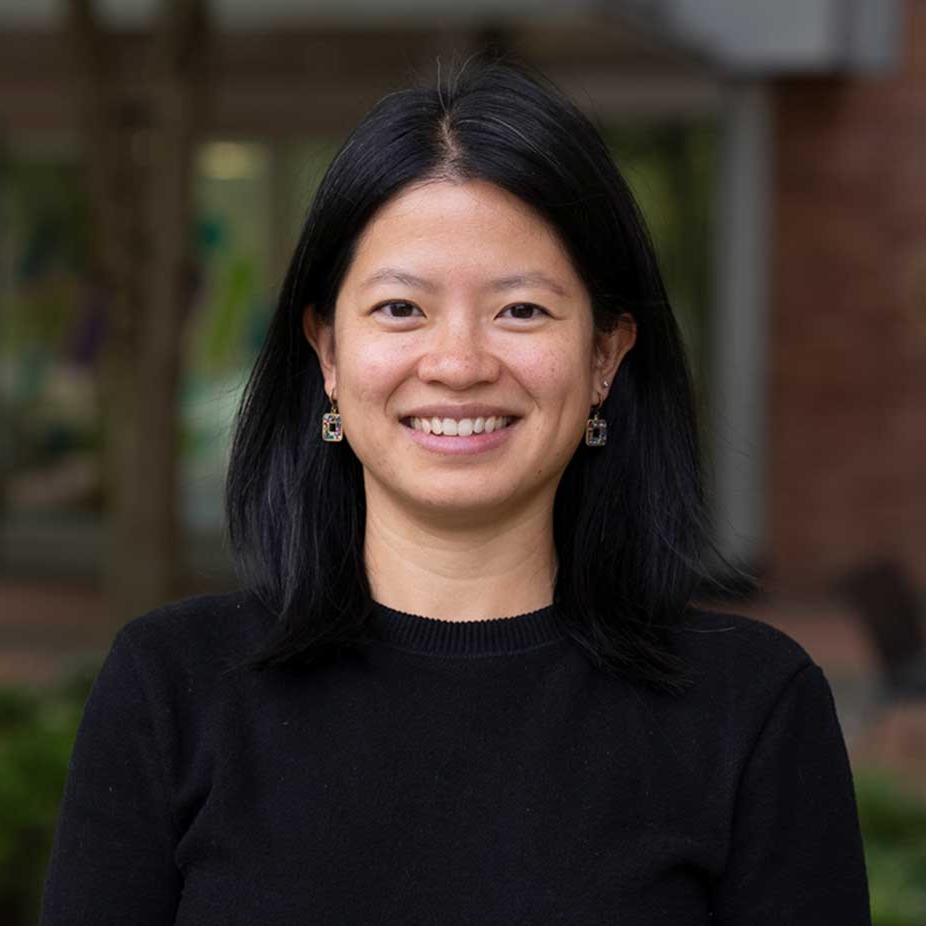 Dr. Nina Tan looking forward and smiling at camera. 