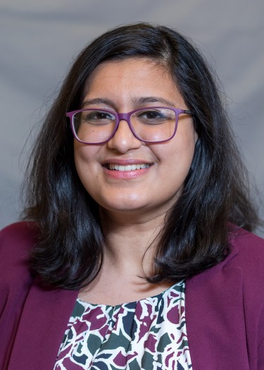 Dr. Puri smiling