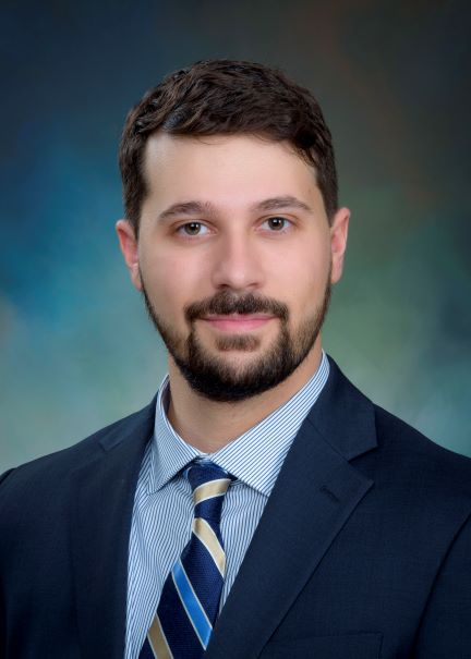 Dr. Youssef smiling